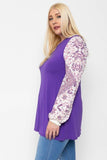 Floral Print, Contrasting Bubble Sleeves Tunic With A Round Neckline.