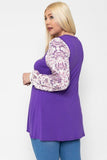 Floral Print, Contrasting Bubble Sleeves Tunic With A Round Neckline.